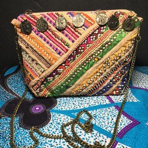 Love Sam Boho multi colored crossbody chain. w/ 7 medallions. hard to find.